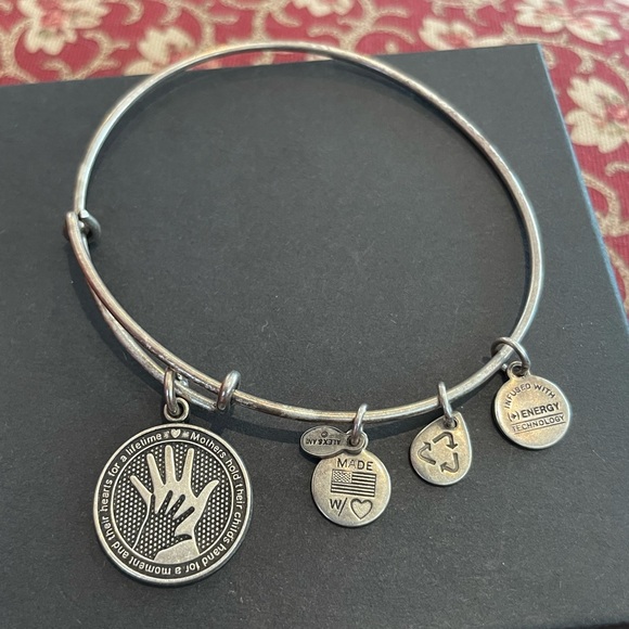 Alex and Ani Jewelry - FREE W/ $20 BUNDLE Alex & Ani Mother’s hold child hand & their heart forever